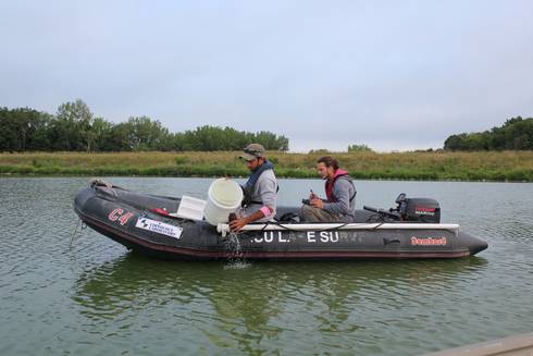 field technicians sample a lake in Iowa