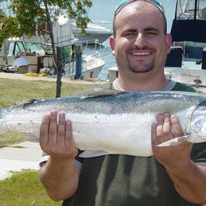 Showing off catch from charter fishing