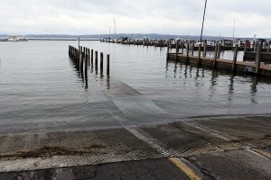 high water covering a marina dock
