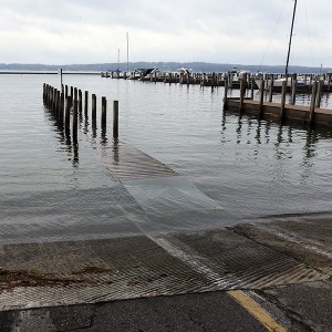 high water covering a marina dock