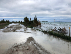 Water over the road near Mackinac bridge