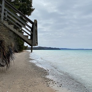 Lake erodes away the shoreline and exposed stairway to beach