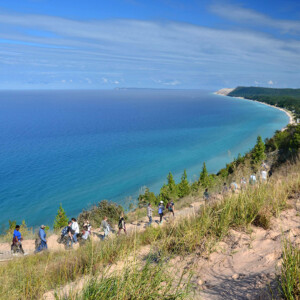 Sleeping Bear National Lakeshore hike along dune with Lake Michigan in background