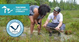 Two students collect data in a fen on Lake Huron
