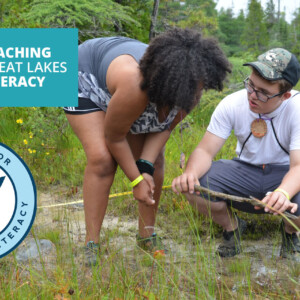 Two students collect data in a fen on Lake Huron