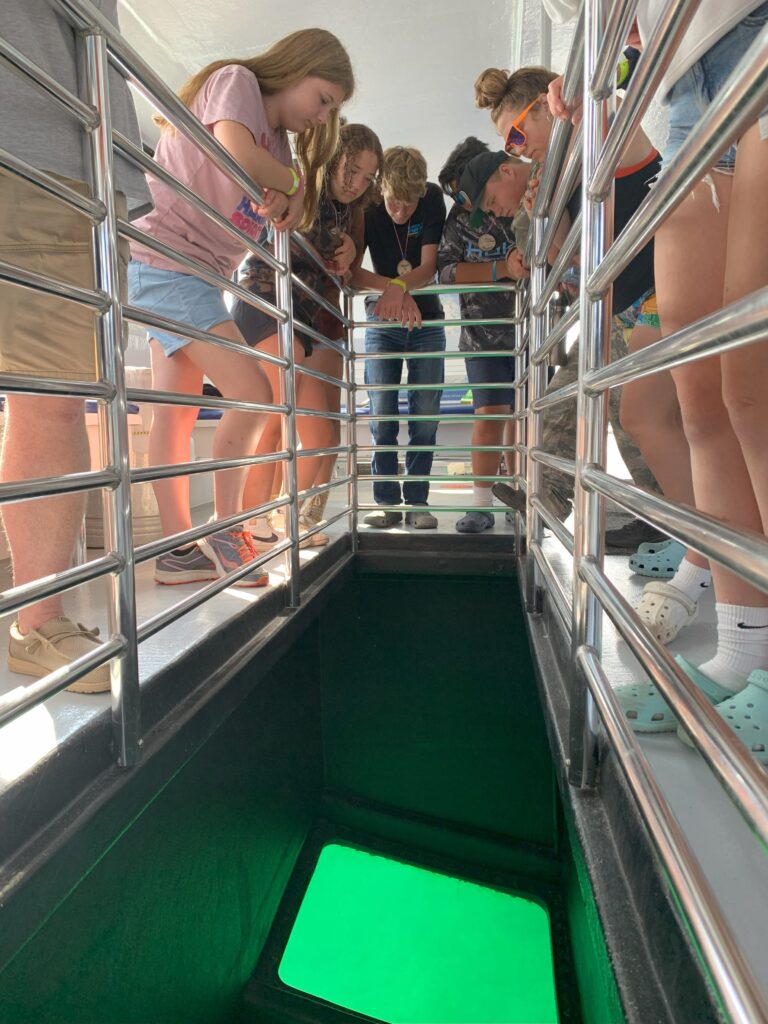 4-H campers look for shipwrecks in Lake Huron on board the Lady Michigan.
