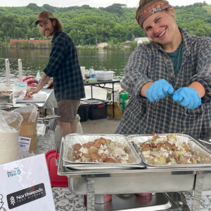 Peterson's Fish Market prepares a whitefish disk for participants