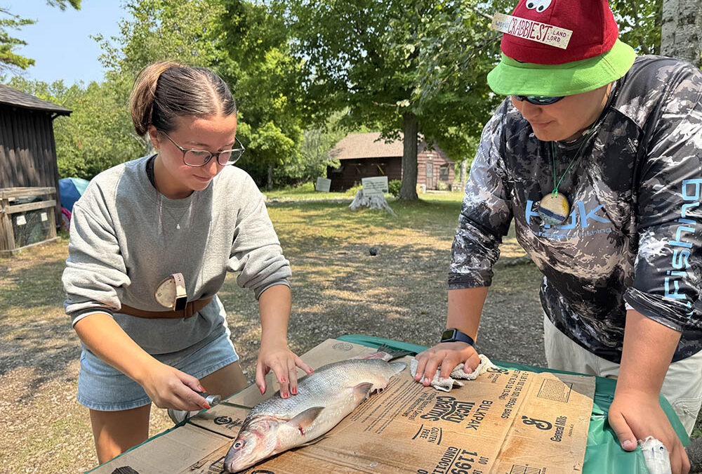 Fishing, snorkeling, sailing – it’s all in a day’s work for these Michigan Sea Grant staffers