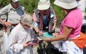 A group of volunteers joining a (Participatory) Citizen Science project with MNFI searching for dragonflies
