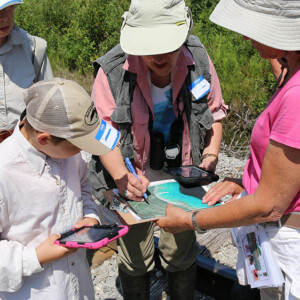 A group of volunteers joining a (Participatory) Citizen Science project with MNFI searching for dragonflies